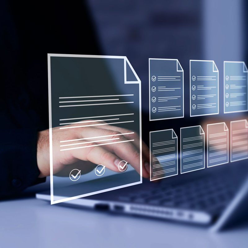 businesswoman-working-laptop-with-virtual-document-management-system